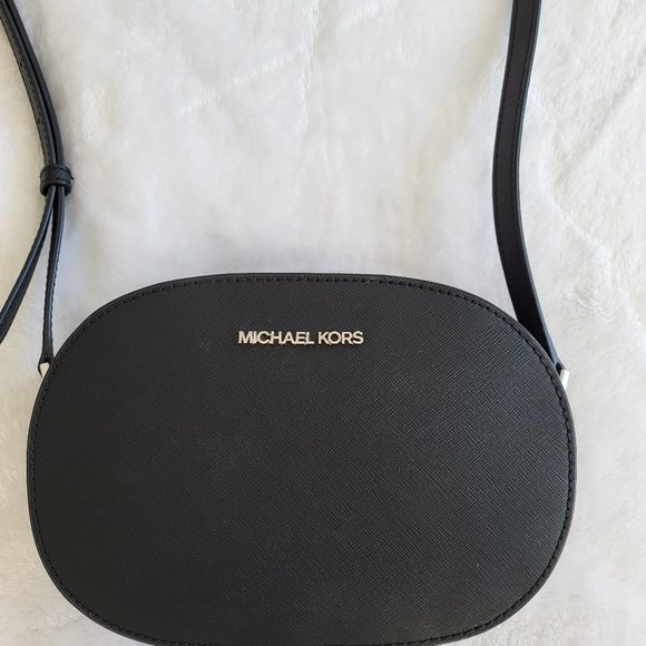 Michael Kors Jet Set Travel Medium Oval crossbody bag - Picture 1 of 2